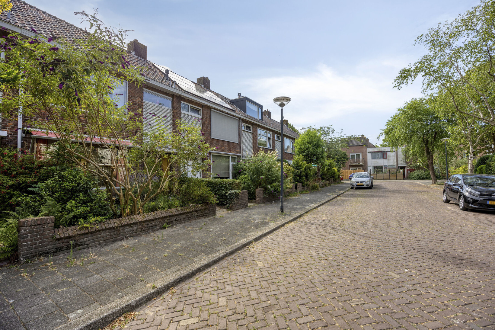 Tussenwoning te koop: Rossinistraat 8, Leiden