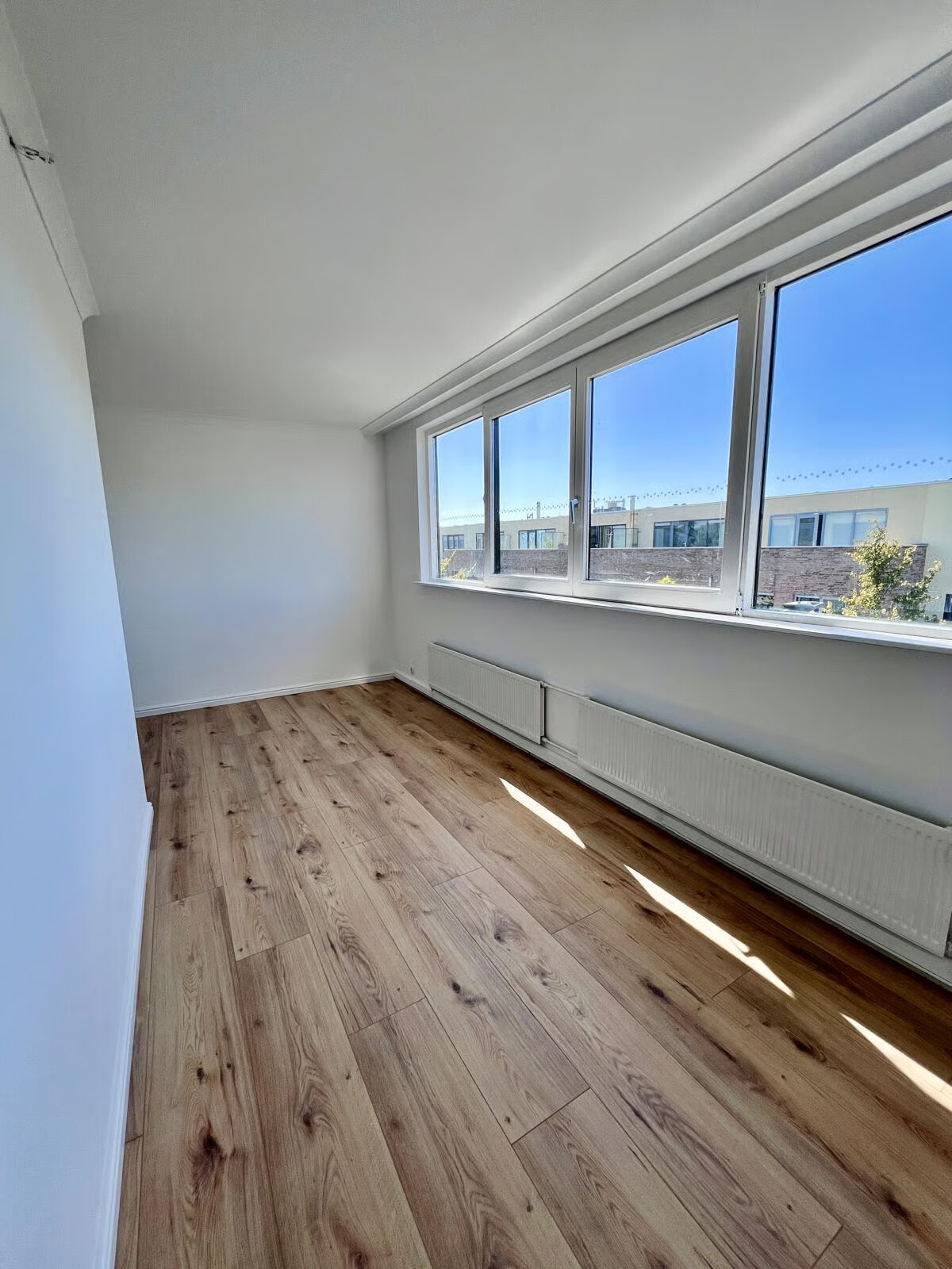Tussenwoning te koop: Wilhelmina Bladergroenweg 24, Leiden