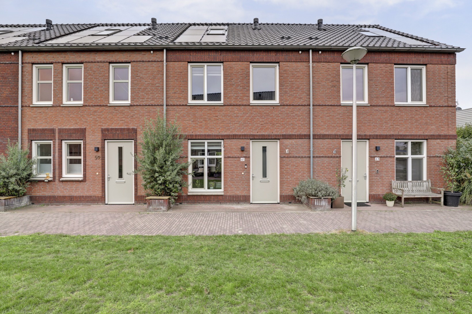 Tussenwoning te koop: Baas en Domburgstraat 61, Bodegraven