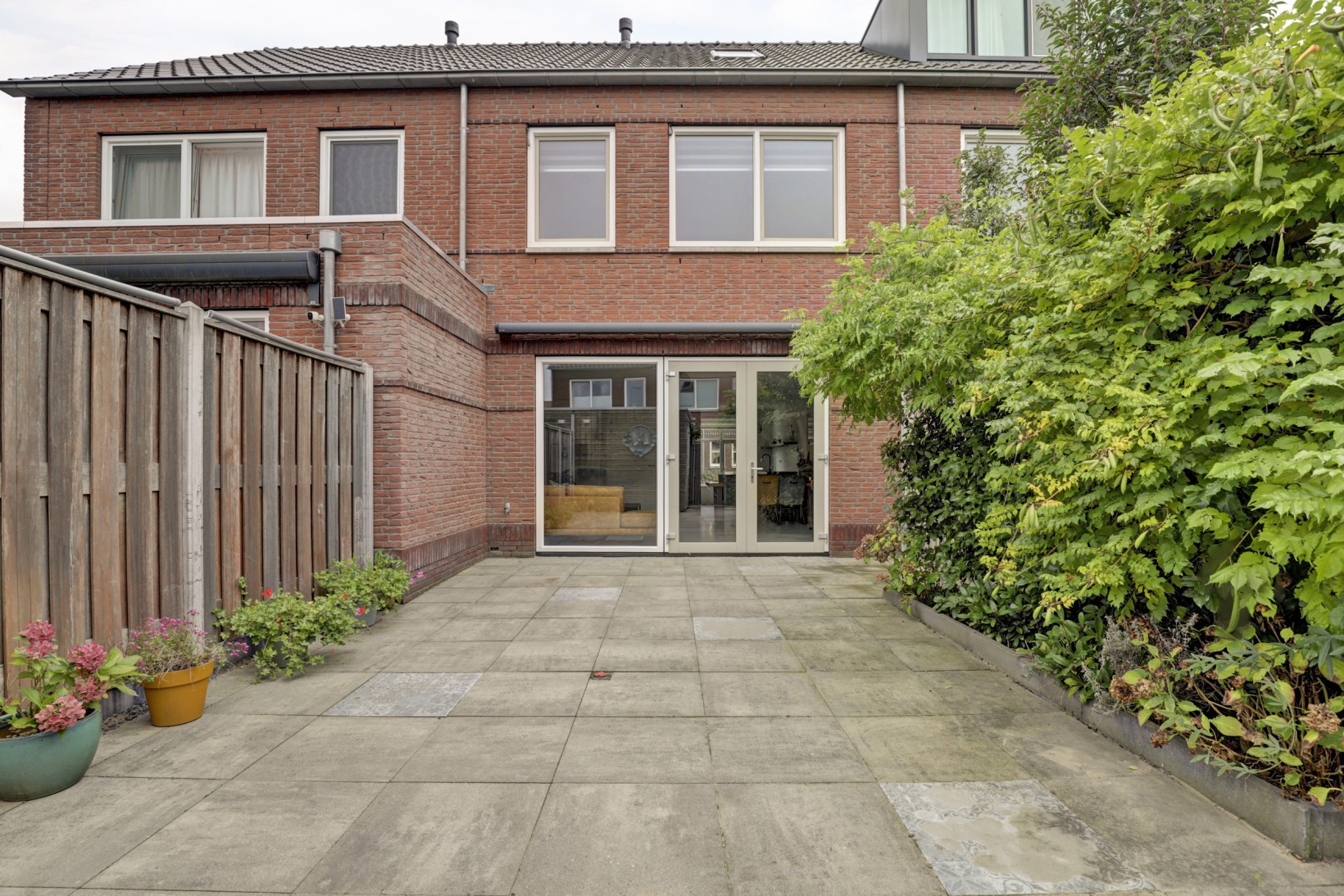 Tussenwoning te koop: Baas en Domburgstraat 61, Bodegraven