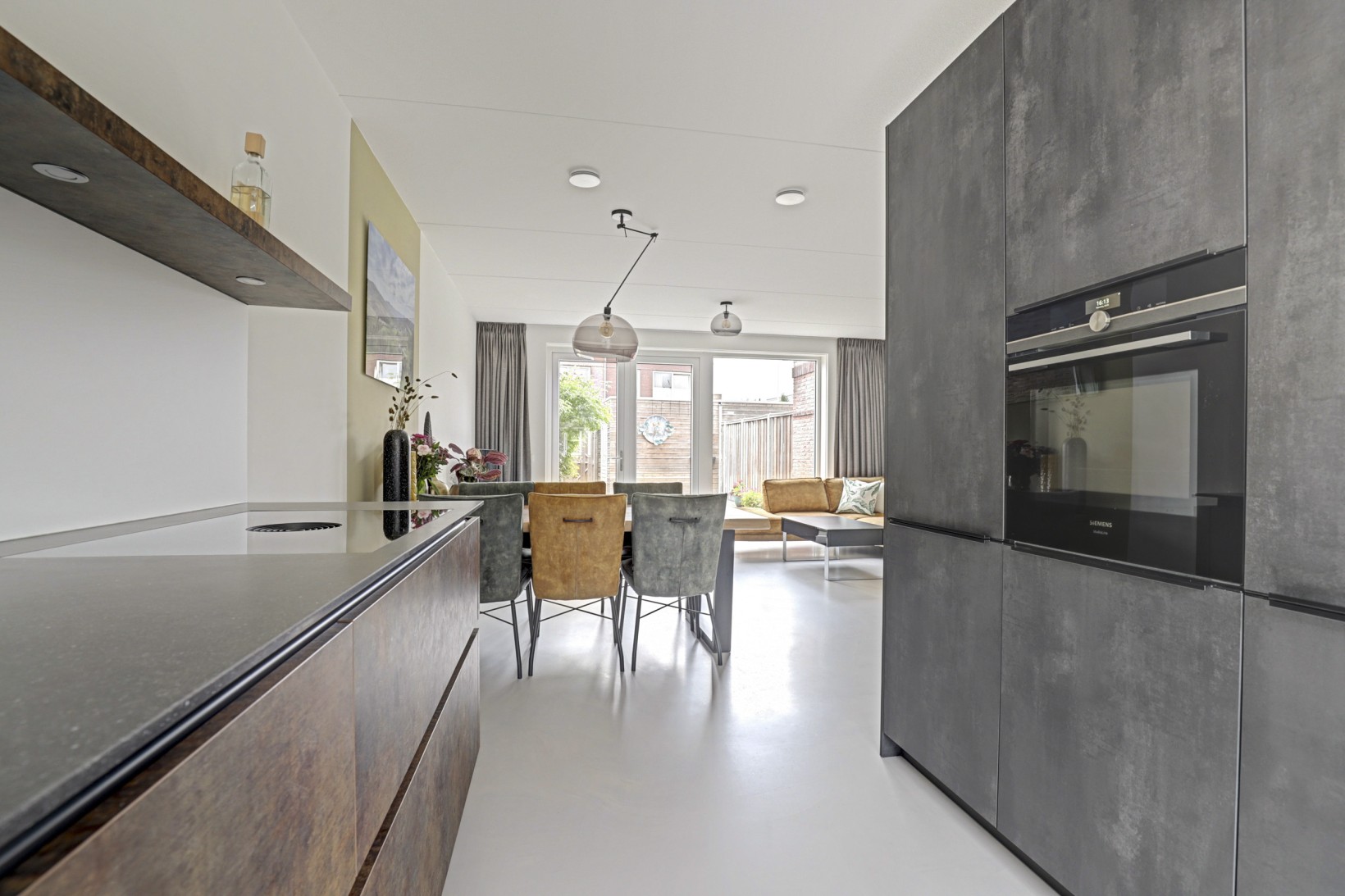 Tussenwoning te koop: Baas en Domburgstraat 61, Bodegraven