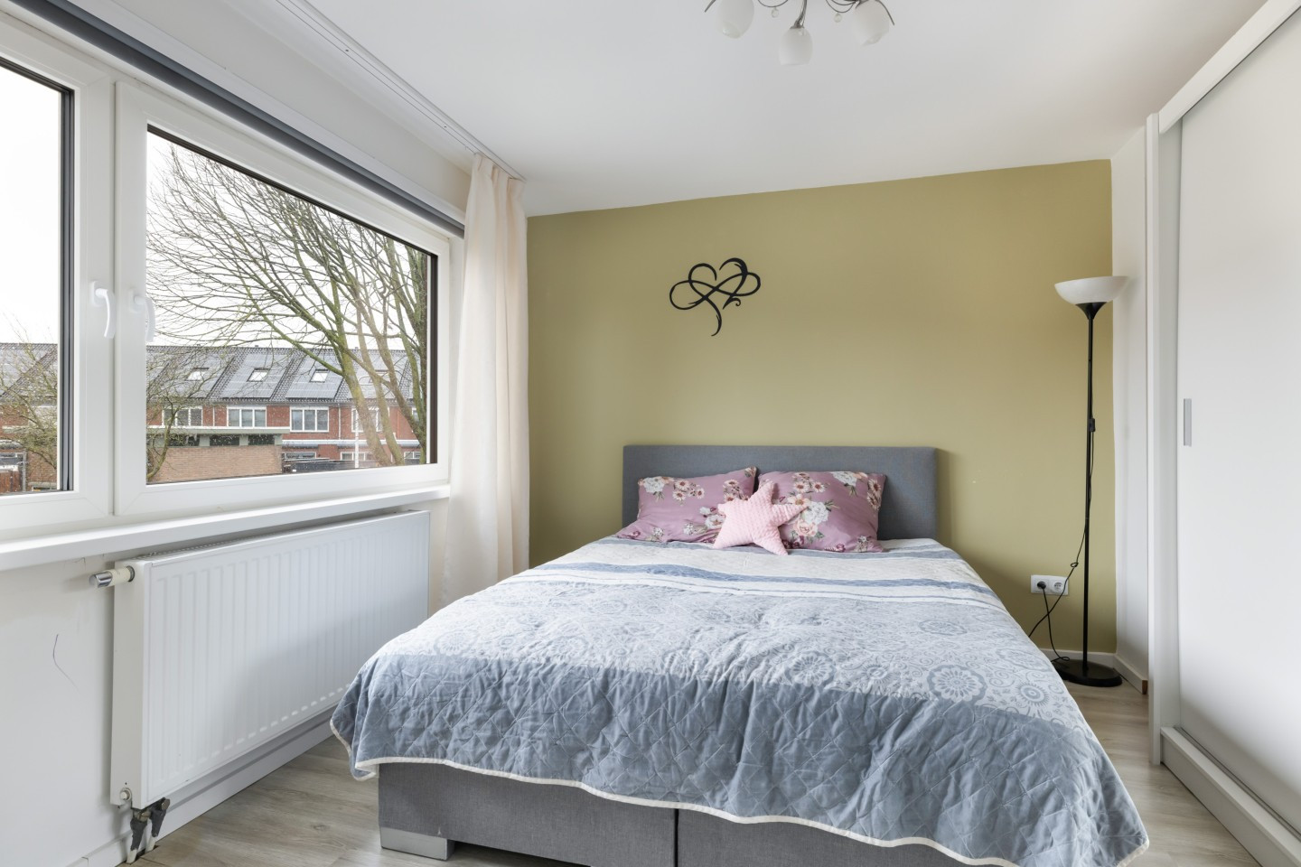 Tussenwoning te koop: Johan Willem Frisostraat 9, Nieuwerbrug Aan Den Rijn