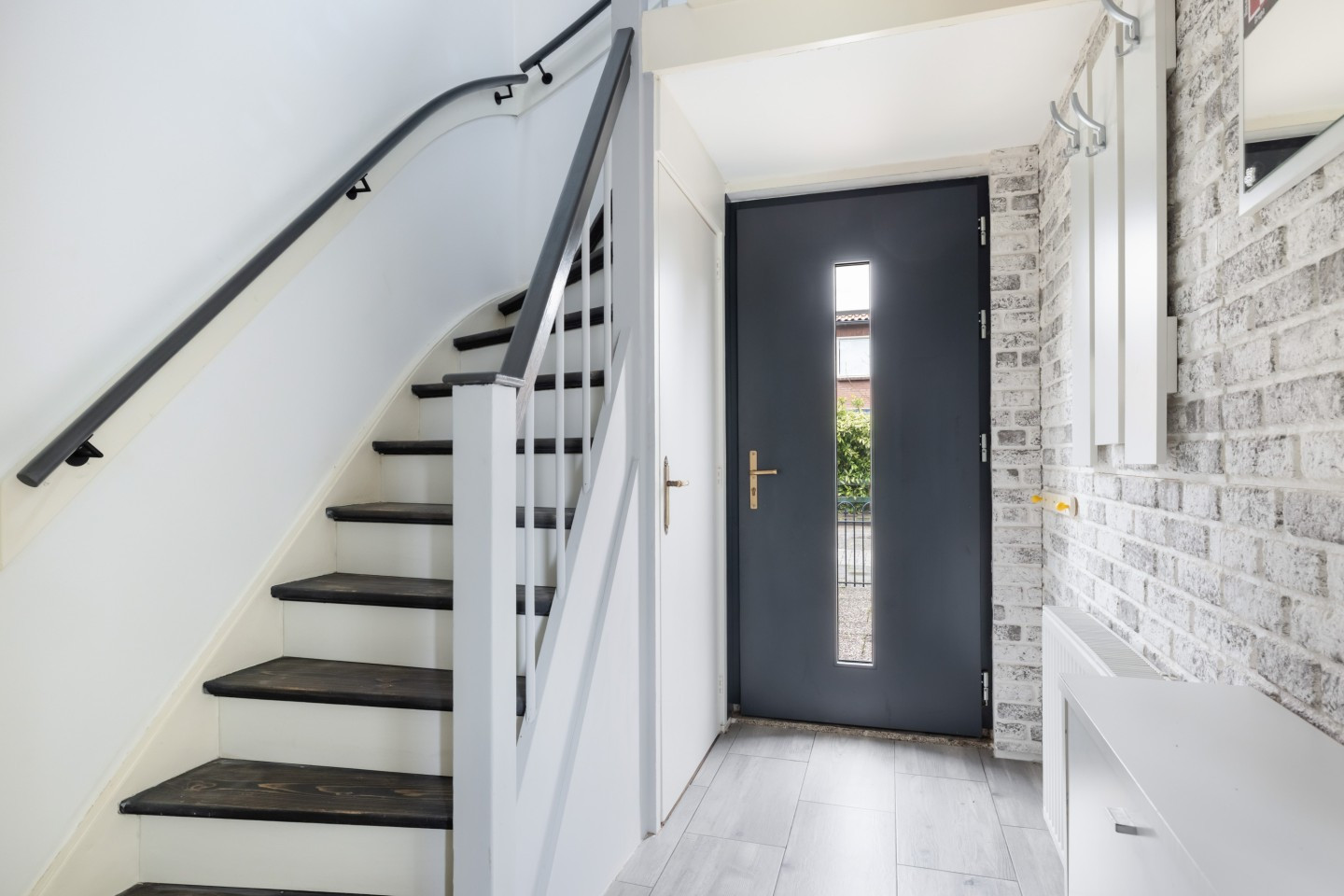 Tussenwoning te koop: Johan Willem Frisostraat 9, Nieuwerbrug Aan Den Rijn