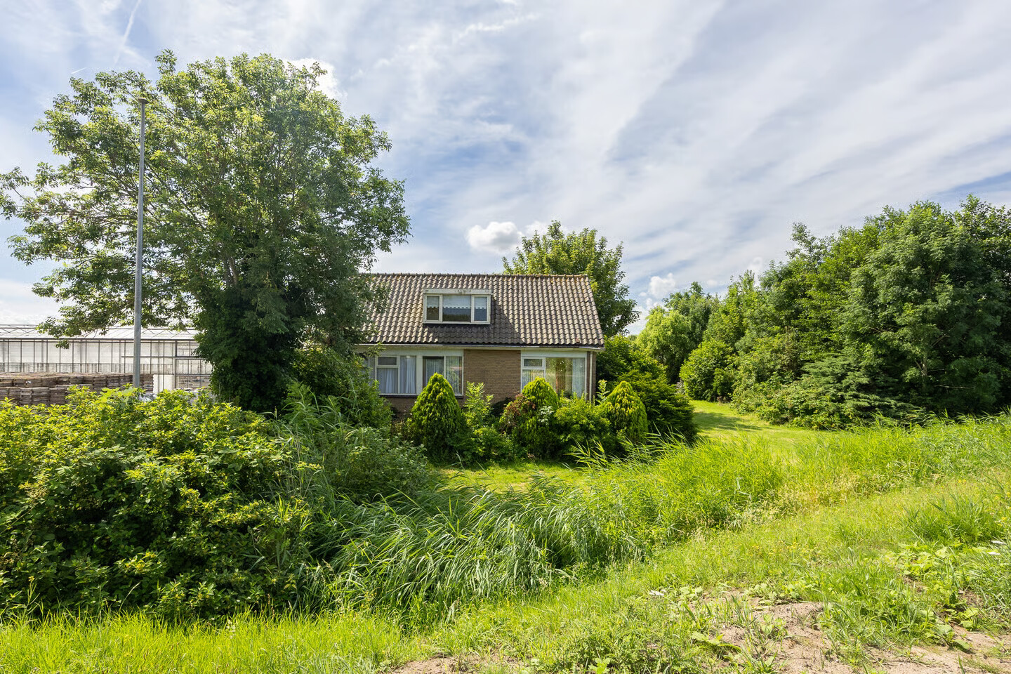 Vrijstaande woning te koop: Nieuwveens Jaagpad 83, Nieuwveen