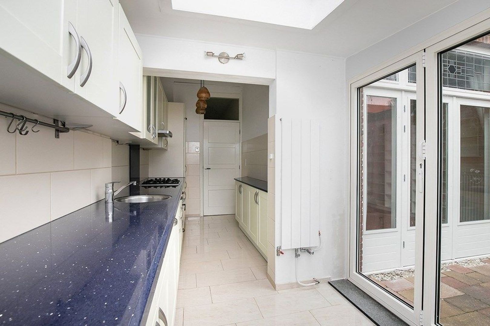 Tussenwoning te huur: Rietzangerlaan 15, 'S-Gravenhage