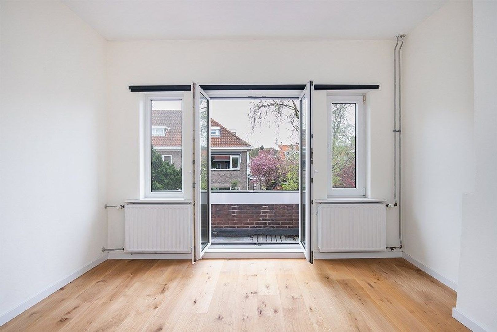 Tussenwoning te huur: Rietzangerlaan 15, 'S-Gravenhage