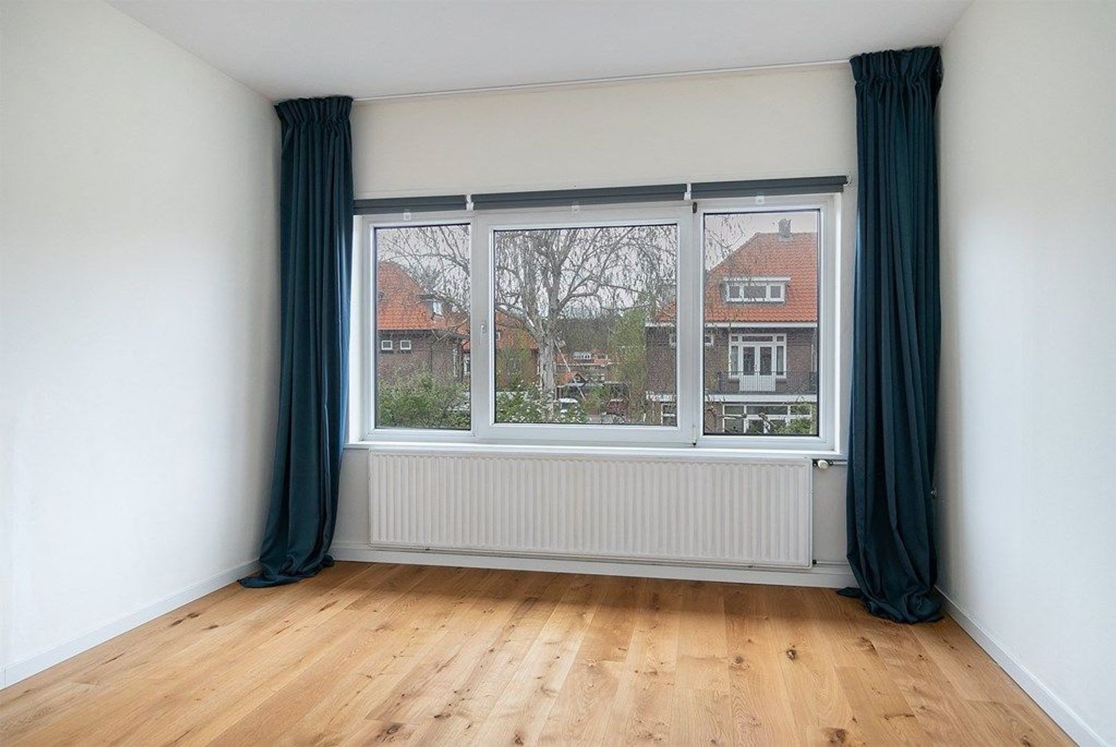 Tussenwoning te huur: Rietzangerlaan 15, 'S-Gravenhage