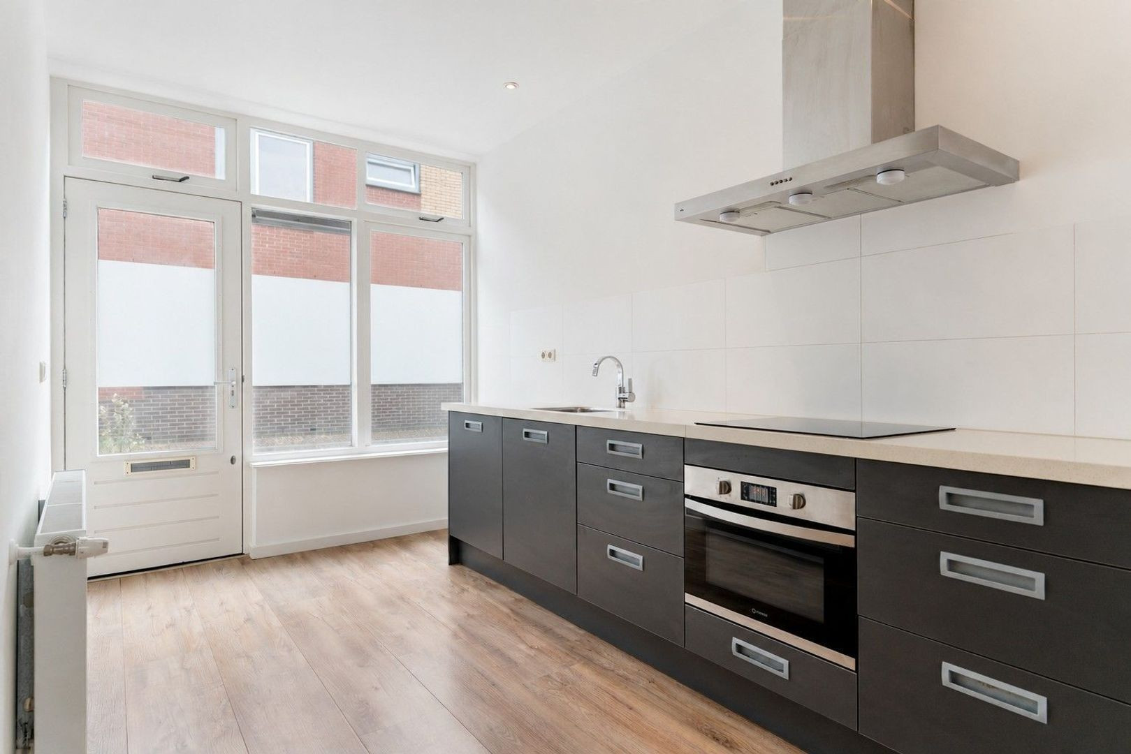 Tussenwoning te koop: Pootstraat 60, Delft