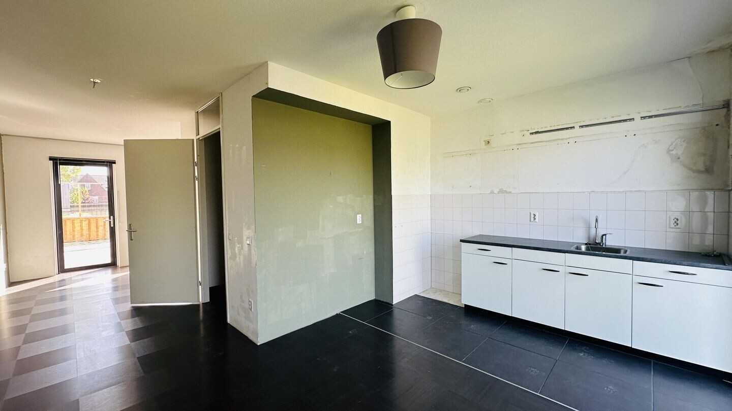 Tussenwoning te koop: Zuiddijk 22, Delft