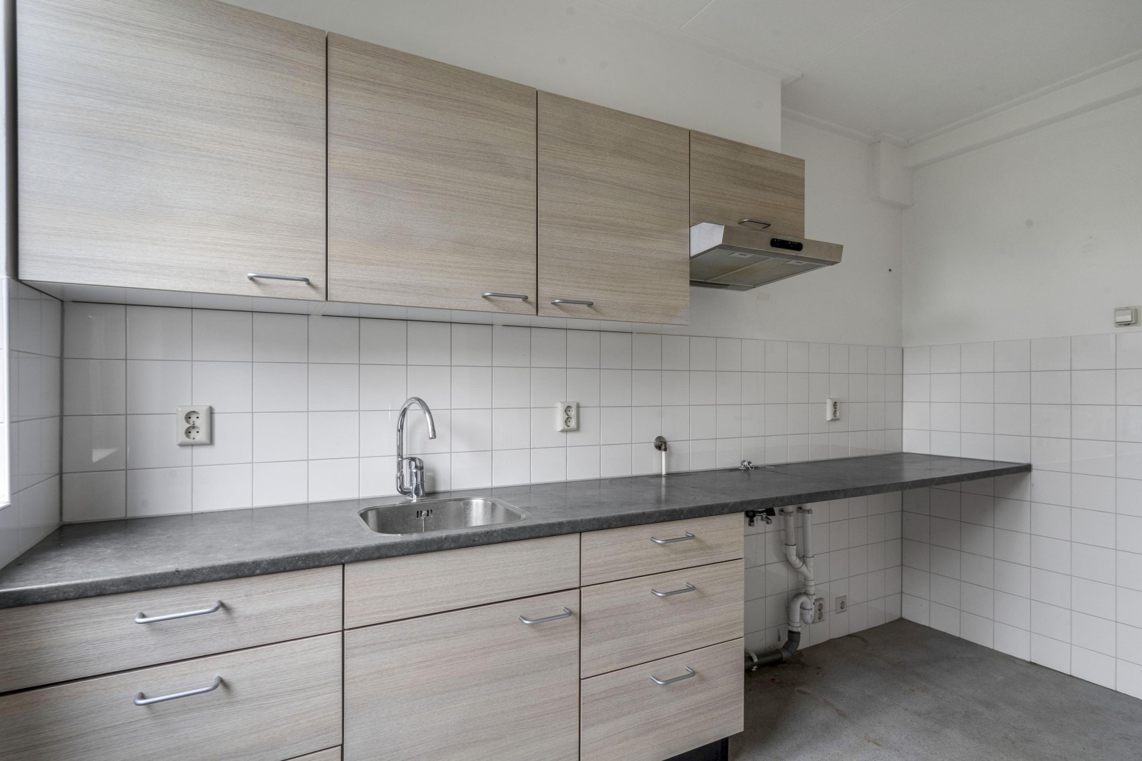 Tussenwoning te koop: Dahliastraat 12, Zevenhuizen