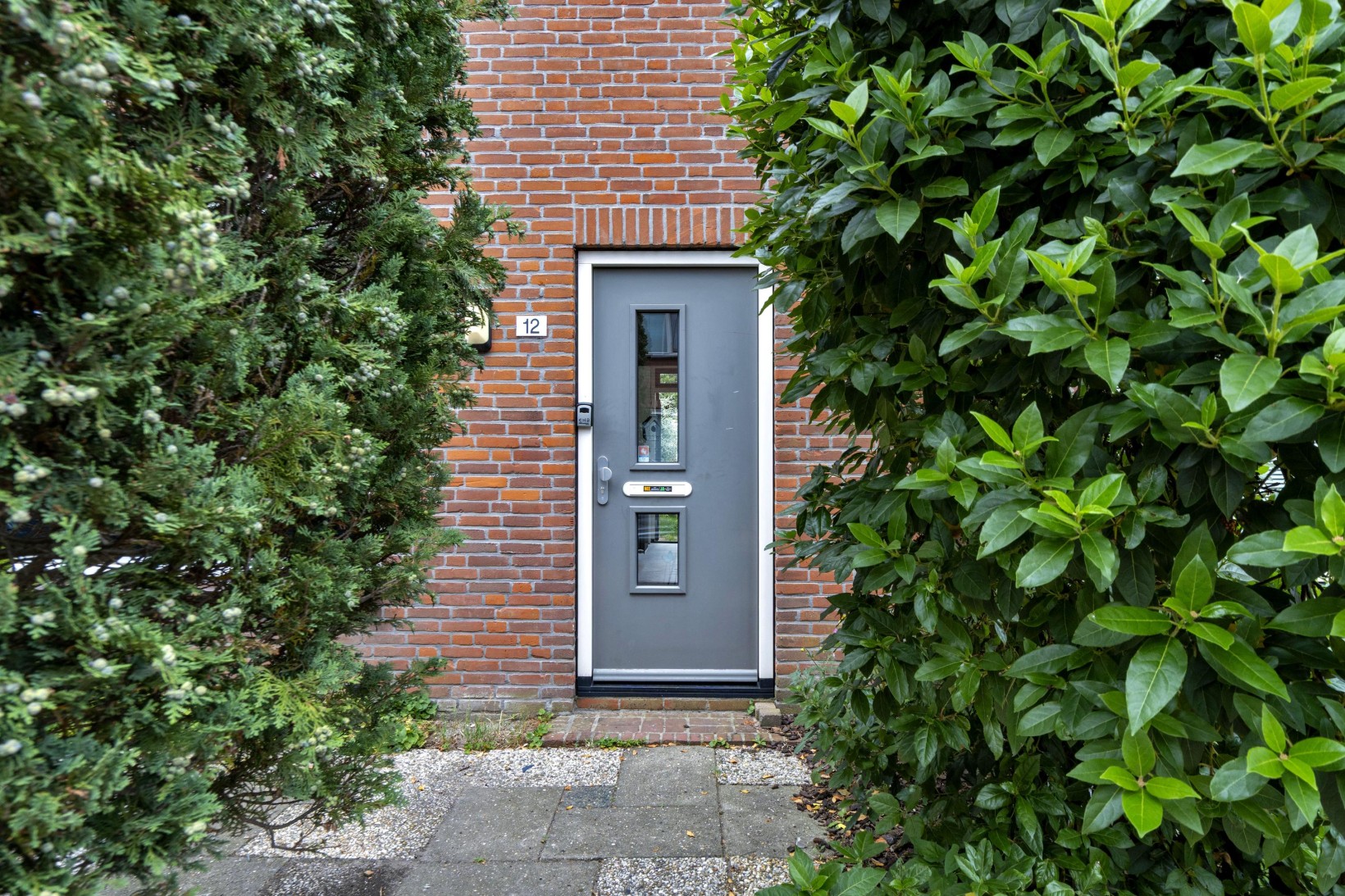 Tussenwoning te koop: Dahliastraat 12, Zevenhuizen