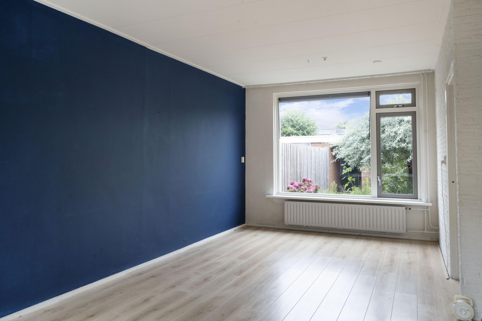 Tussenwoning te koop: Dahliastraat 12, Zevenhuizen