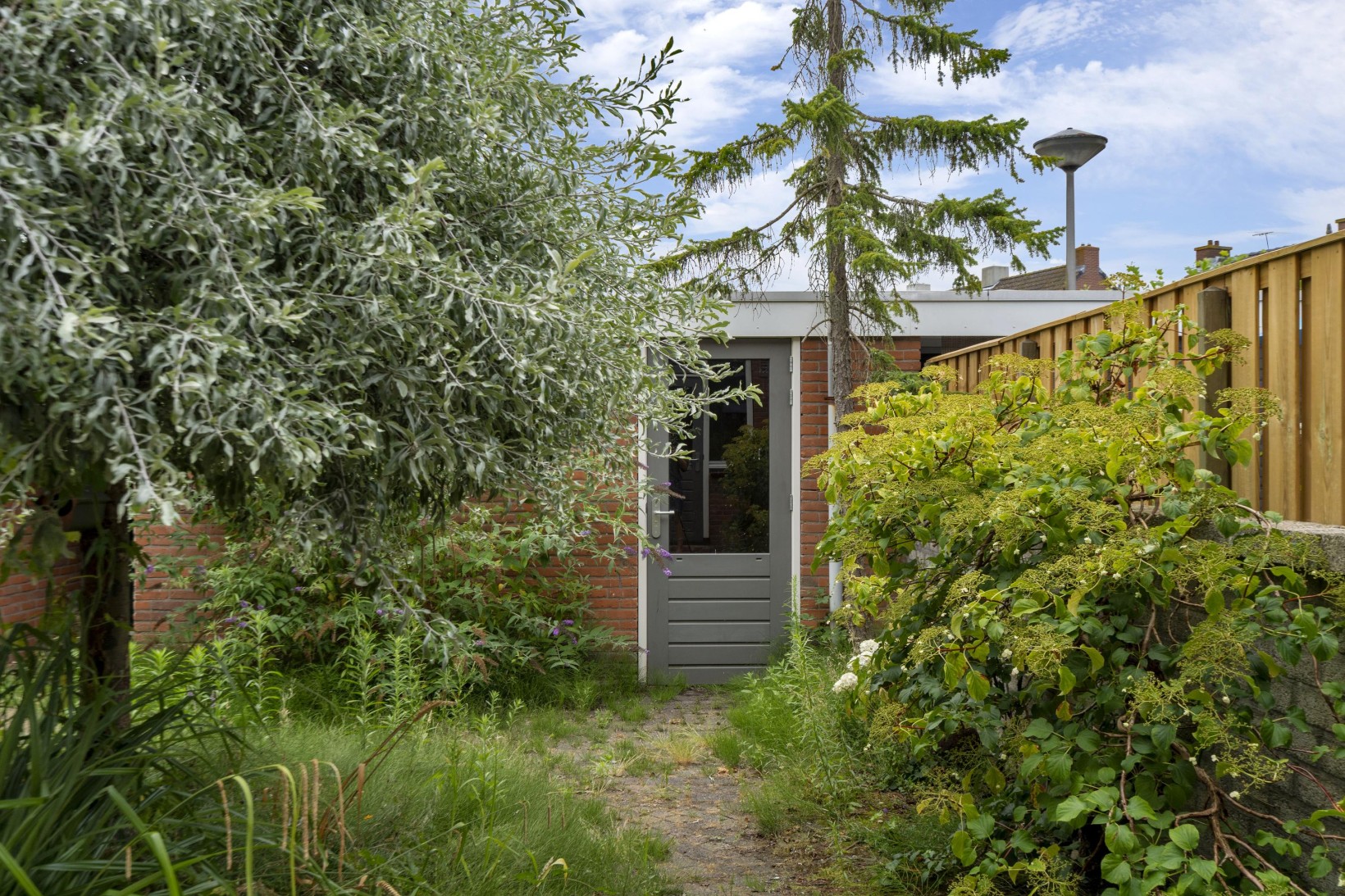 Tussenwoning te koop: Dahliastraat 12, Zevenhuizen
