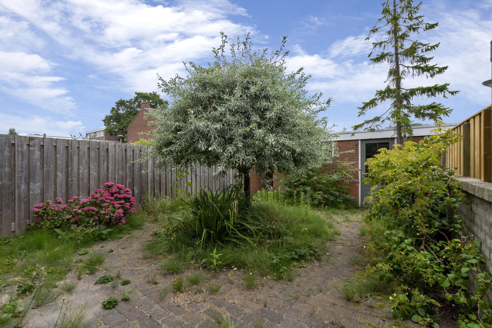 Tussenwoning te koop: Dahliastraat 12, Zevenhuizen