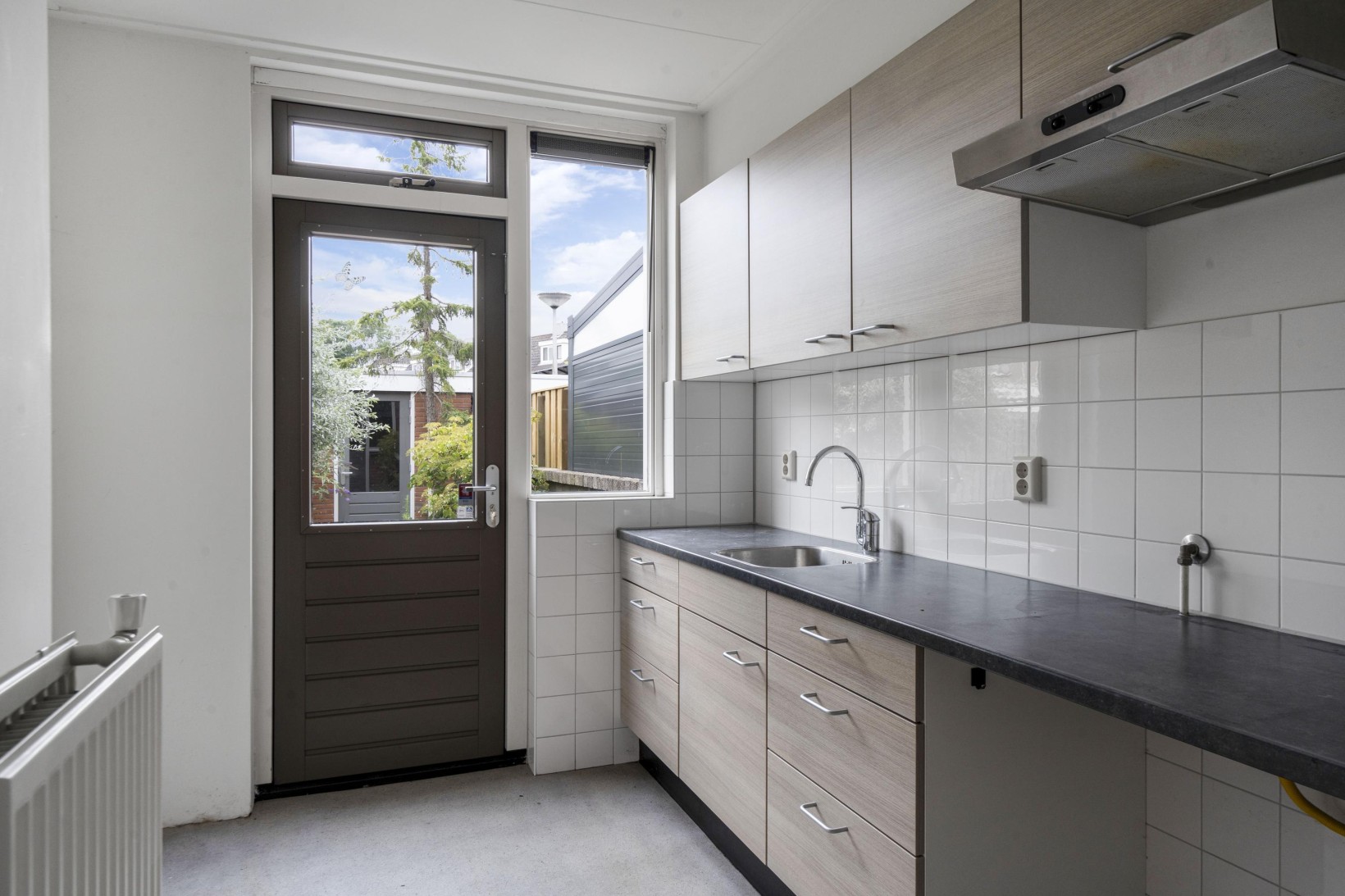 Tussenwoning te koop: Dahliastraat 12, Zevenhuizen