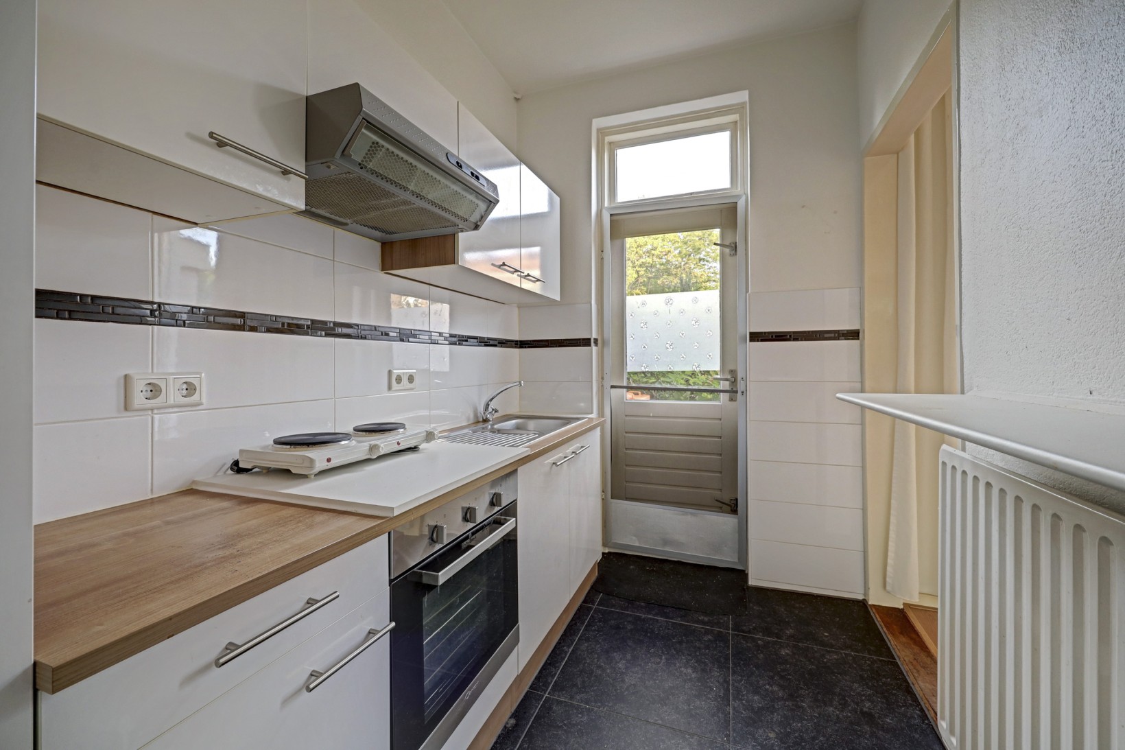 Tussenwoning te koop: van Baerlestraat 49, Gouda