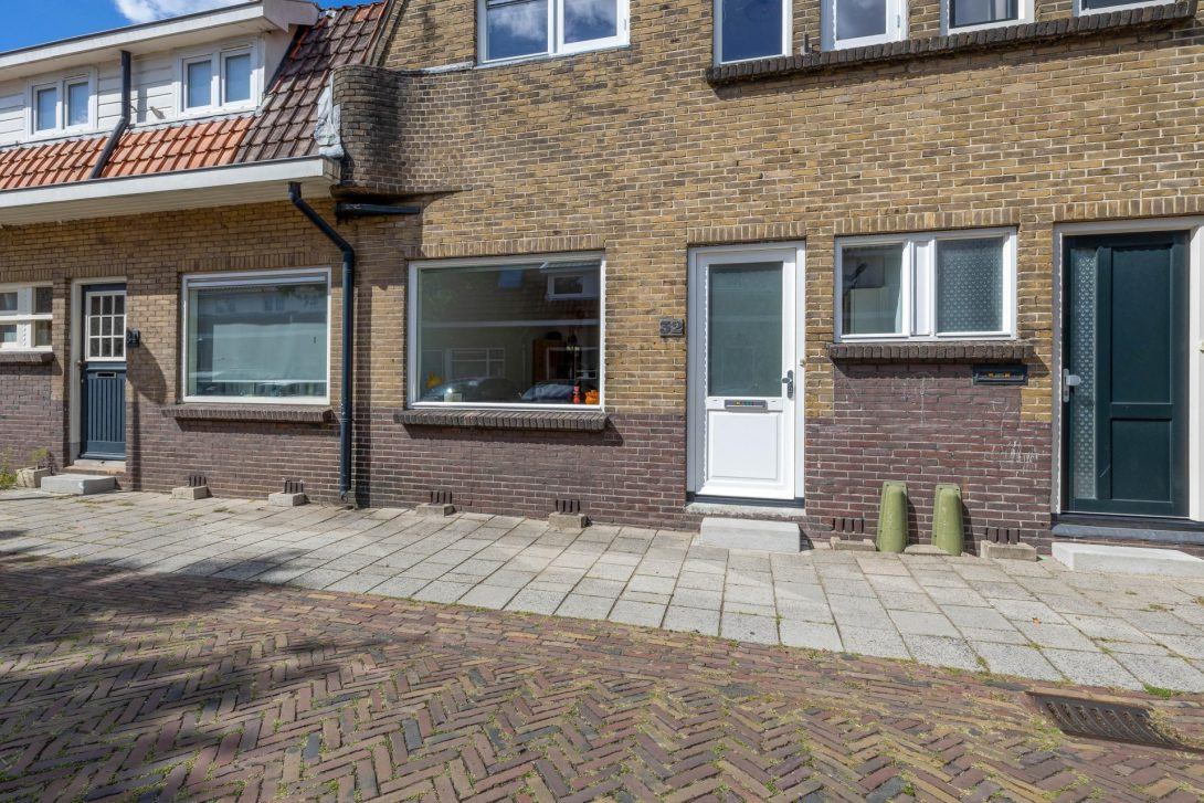 Tussenwoning te koop: Woudstraat 32, Gouda