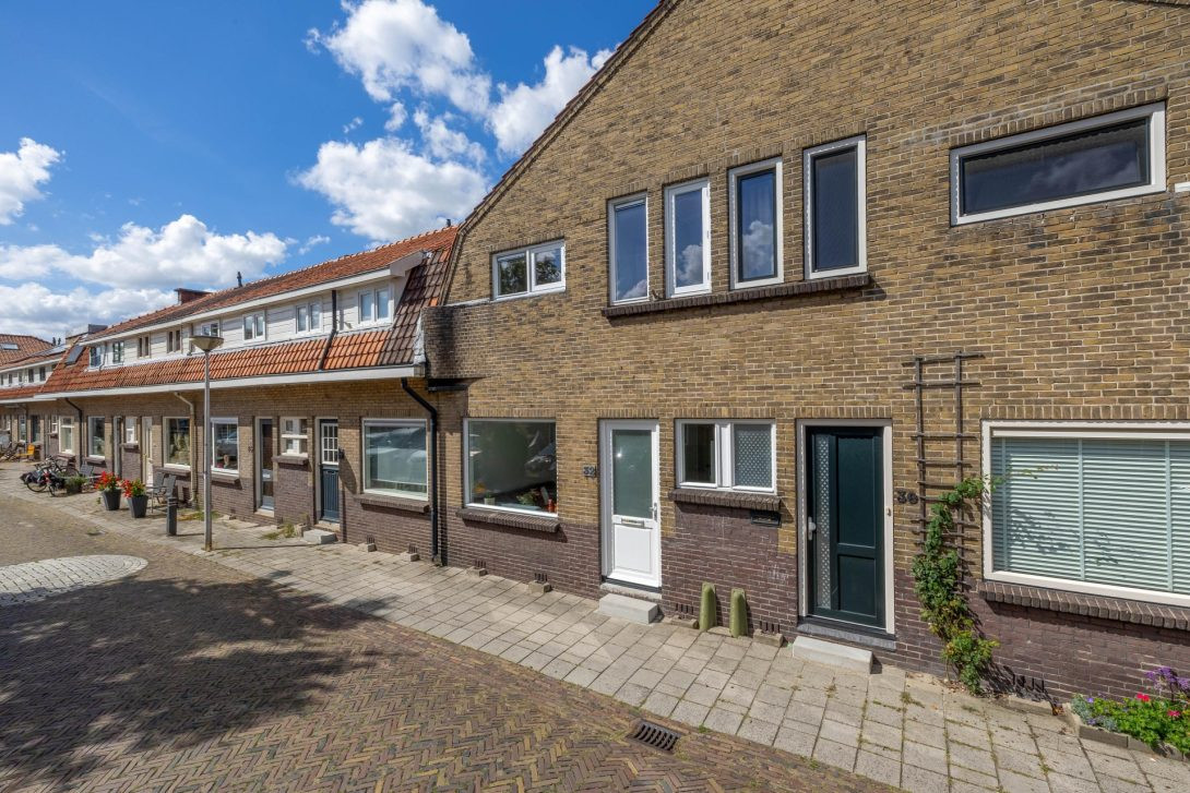 Tussenwoning te koop: Woudstraat 32, Gouda