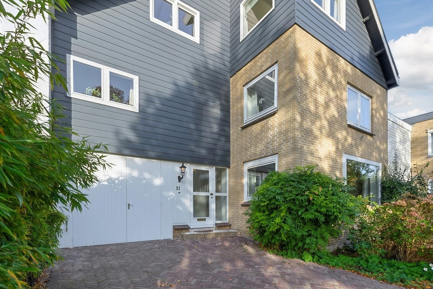 Tussenwoning te koop: Roland Holstlaan 31, Reeuwijk