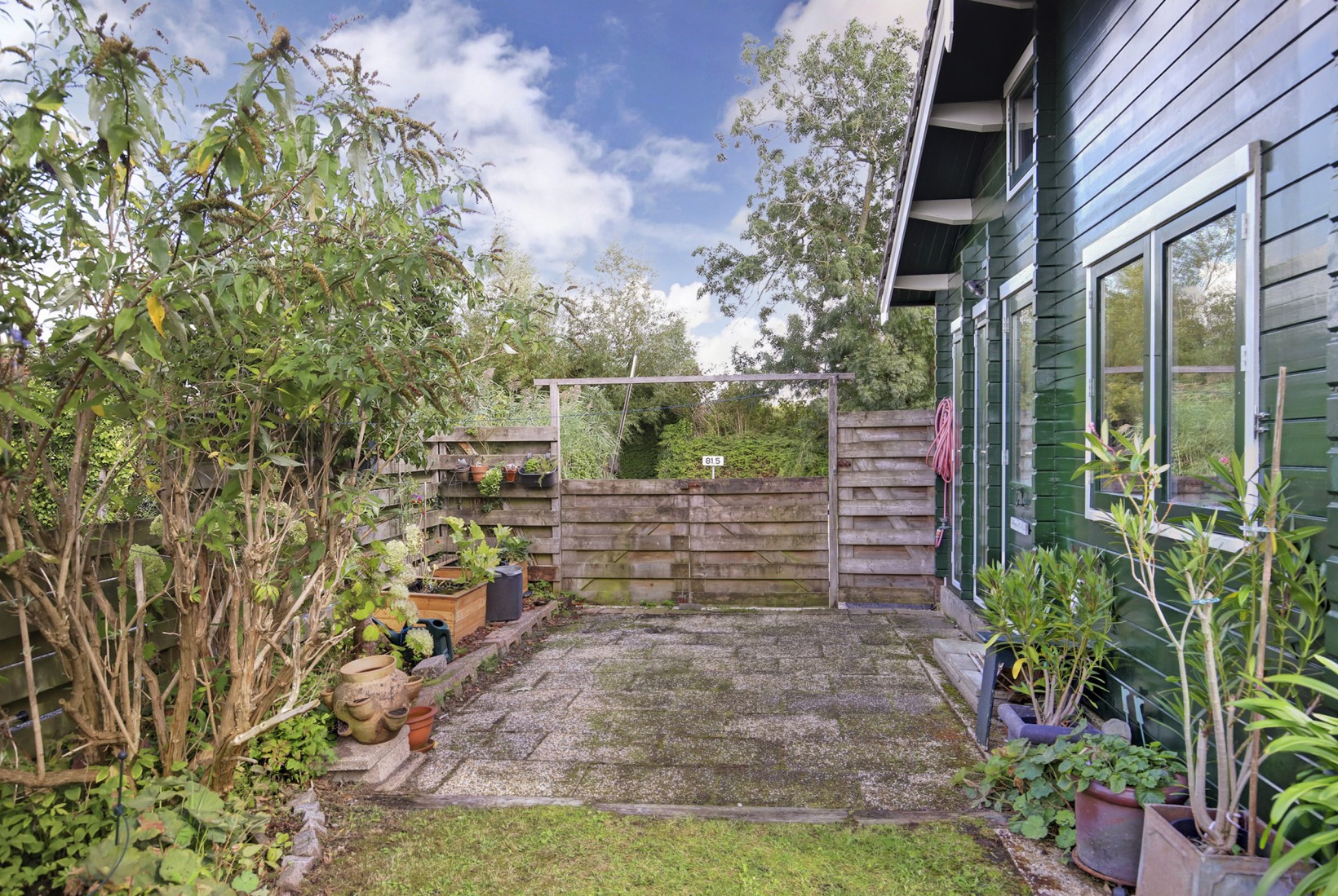 Vrijstaande woning te koop: Platteweg 81-2, Reeuwijk