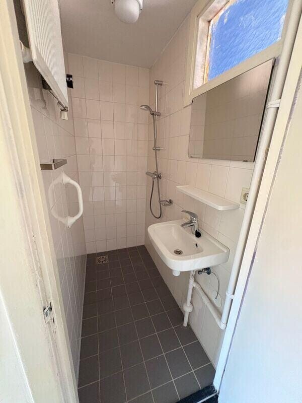 Tussenwoning te koop: Wielrenstraat 9, Rotterdam