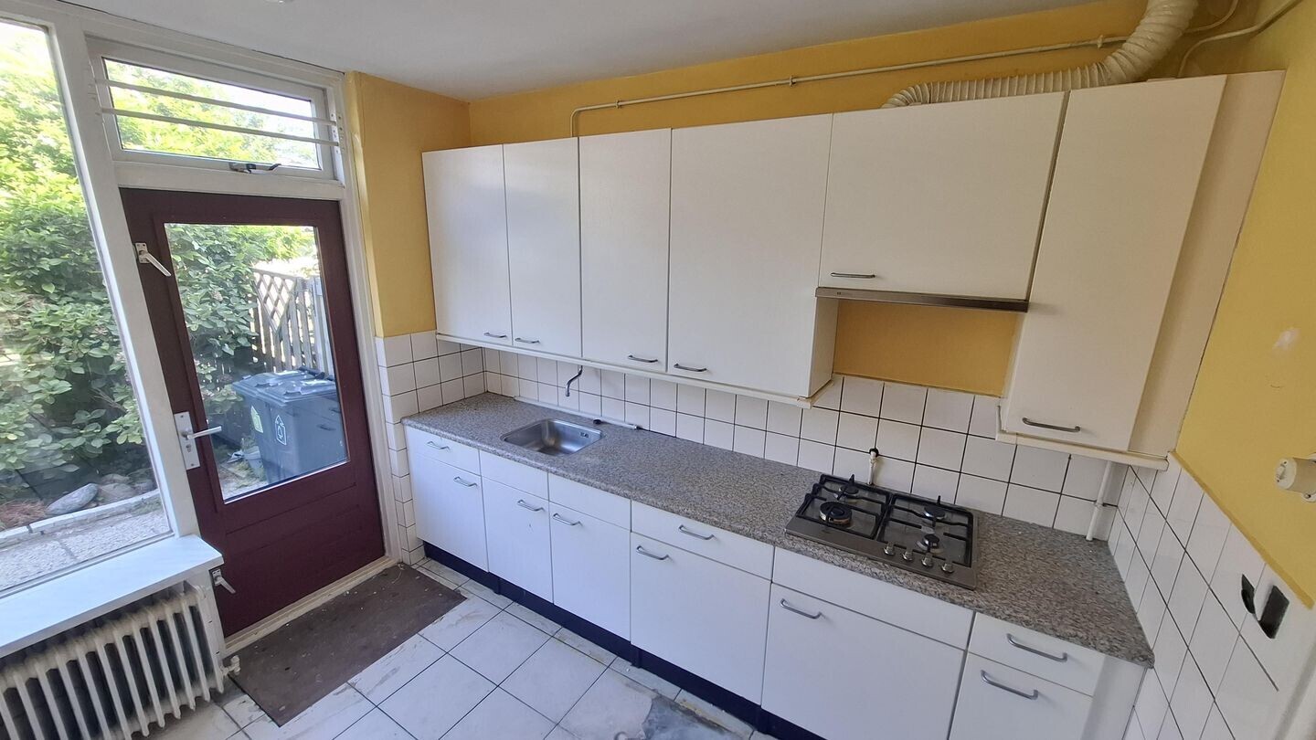 Tussenwoning te koop: Sluiskreek 23, Rotterdam