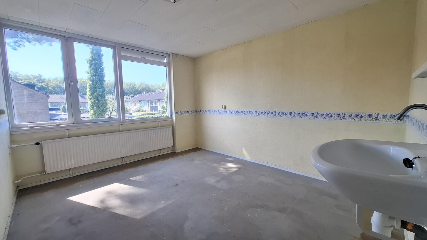 Tussenwoning te koop: Sluiskreek 23, Rotterdam