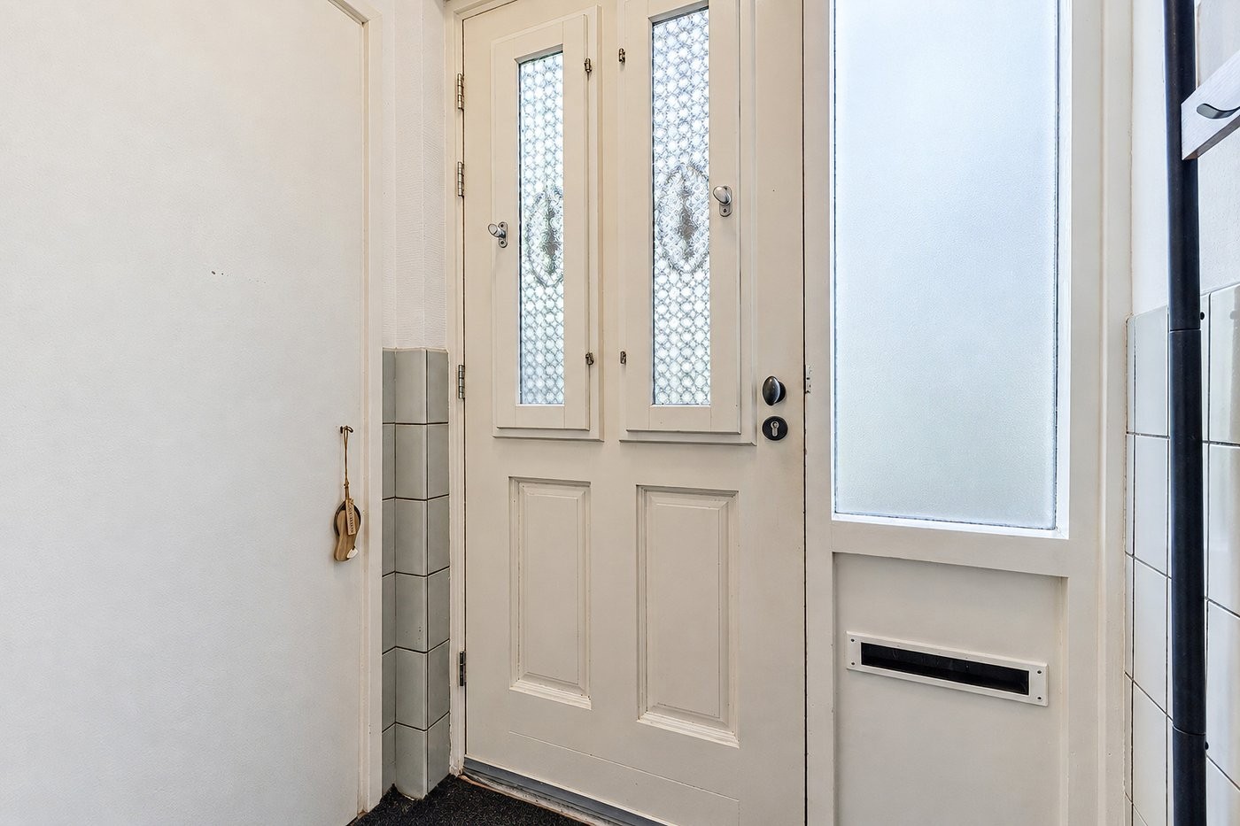 Tussenwoning te koop: Nieuweweg 7, Oostvoorne