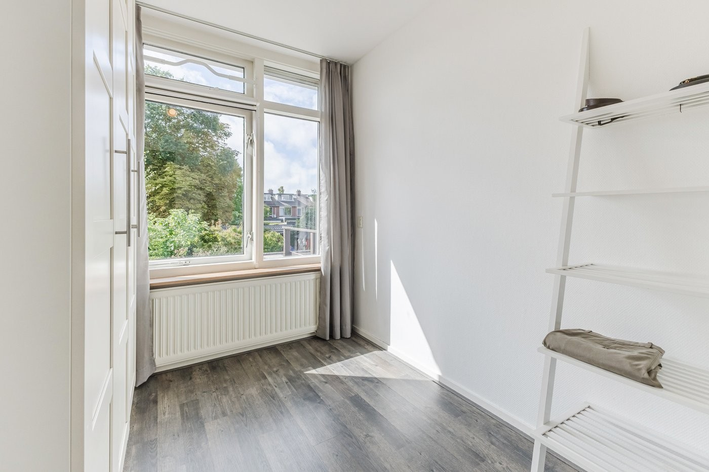 Tussenwoning te koop: Nieuweweg 7, Oostvoorne