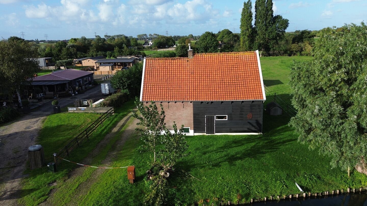 Vrijstaande woning te koop: Bollaarsdijk 2, Oostvoorne