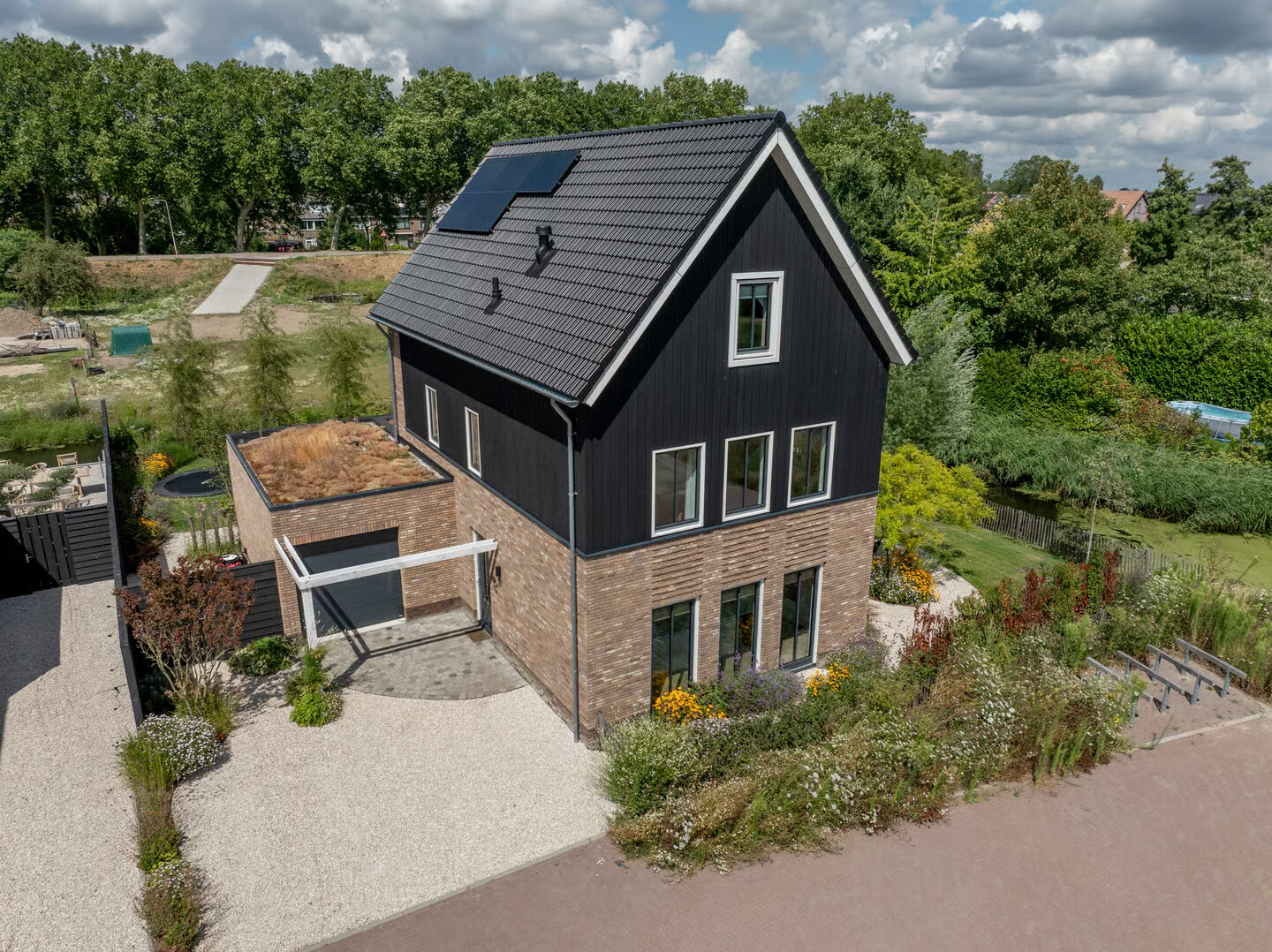 Vrijstaande woning te koop: E. Hamburgerstraat 21, Heinenoord