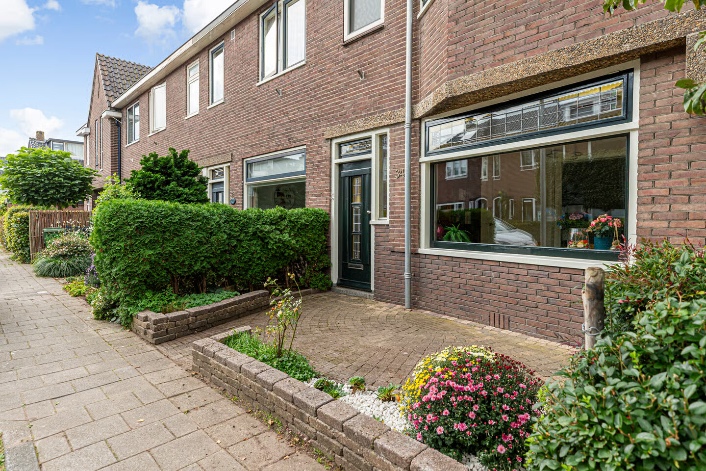 Tussenwoning te koop: Dahliastraat 34, Woerden