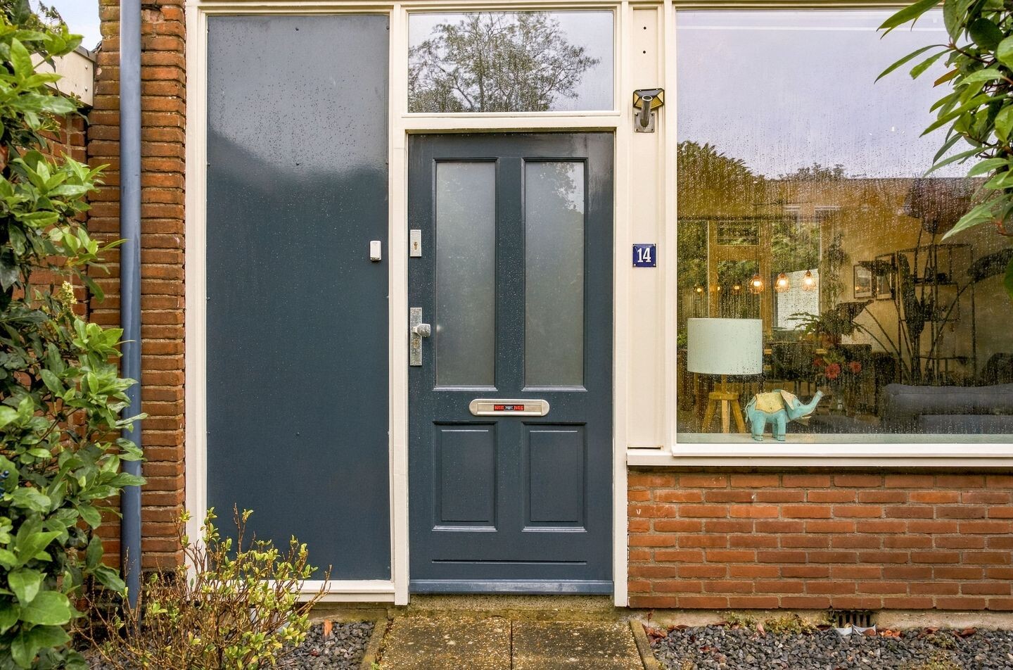 Tussenwoning te koop: Derkinderenstraat 14, Woerden