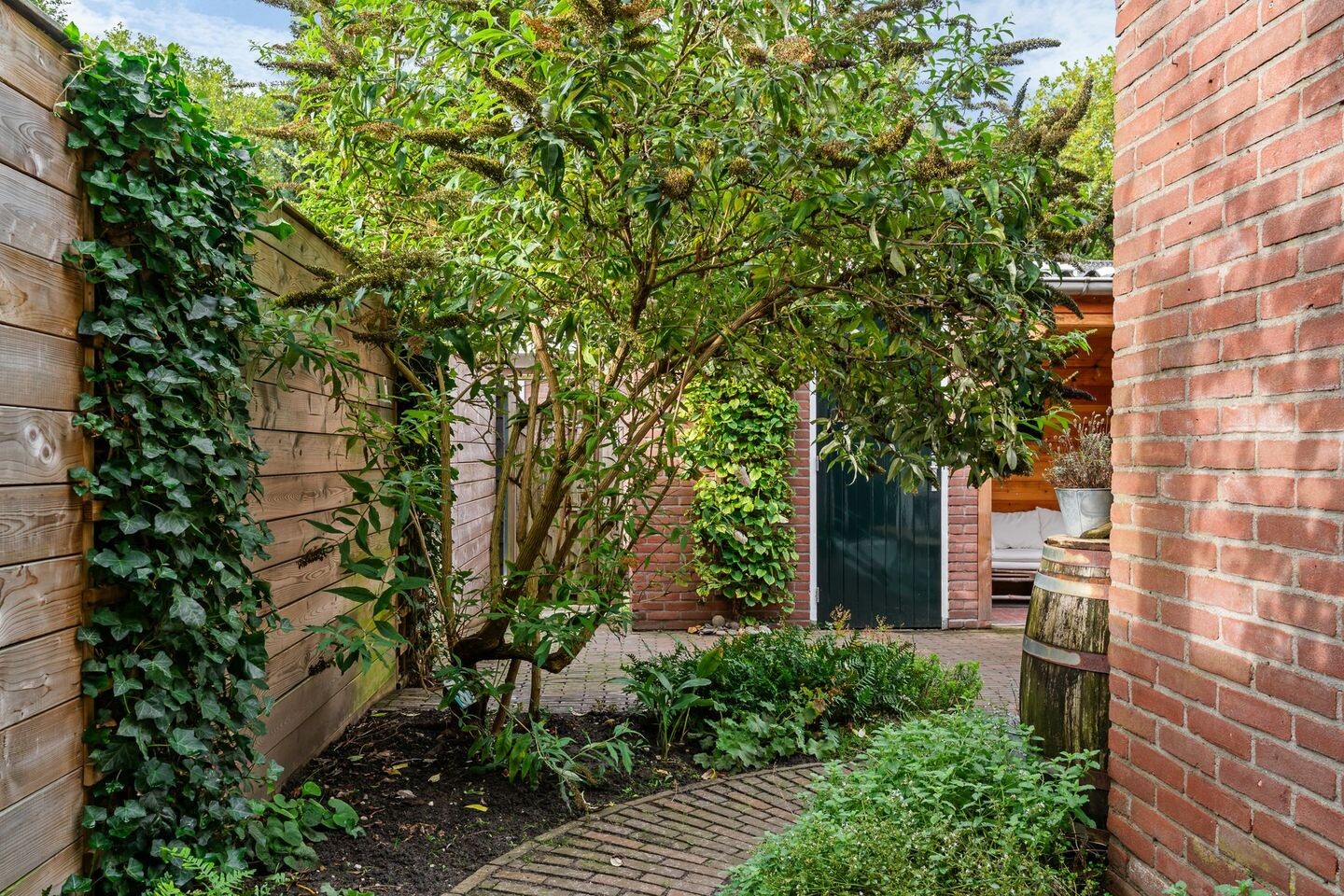Tussenwoning te koop: De Brauwstraat 11, Woerden