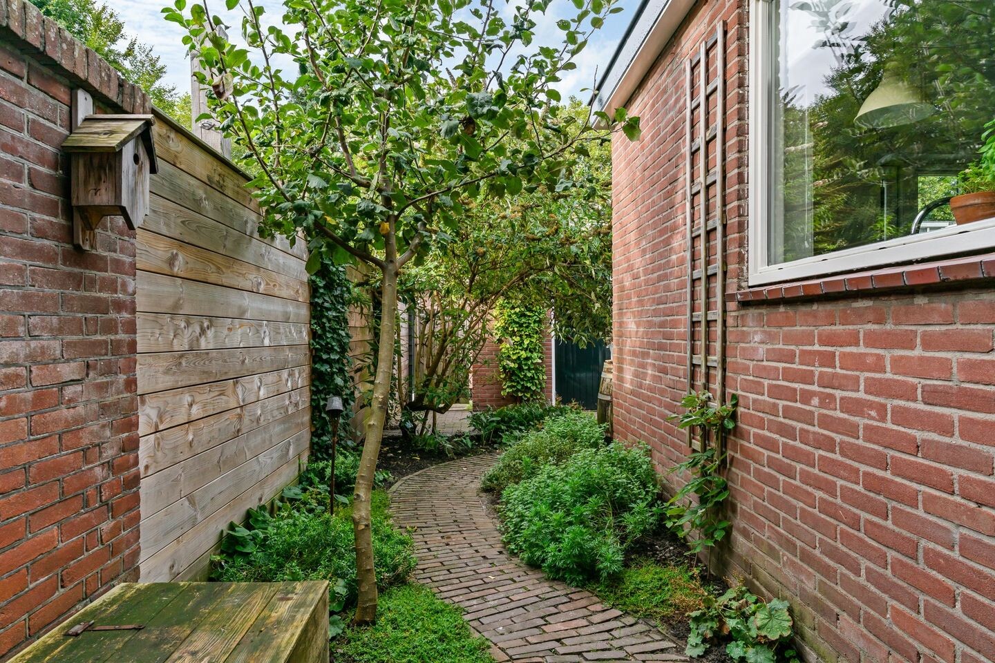 Tussenwoning te koop: De Brauwstraat 11, Woerden