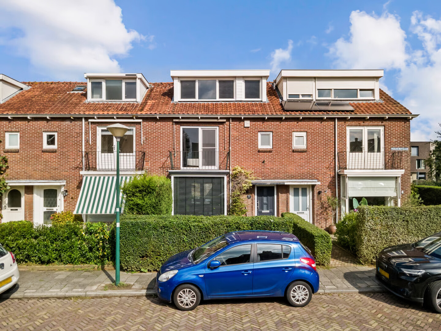 Tussenwoning te koop: Paulus Buyslaan 19, Woerden