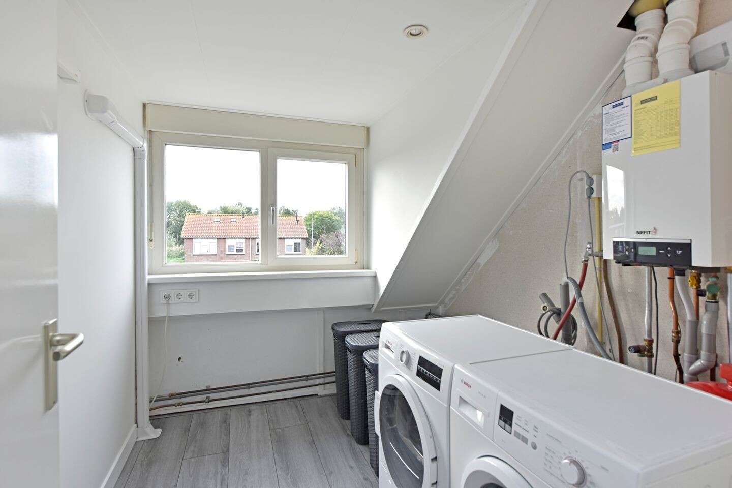 Tussenwoning te koop: Lijsterstraat 10, Woerdense Verlaat