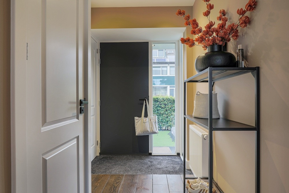 Tussenwoning te koop: Nassaulaan 31, Hoevelaken
