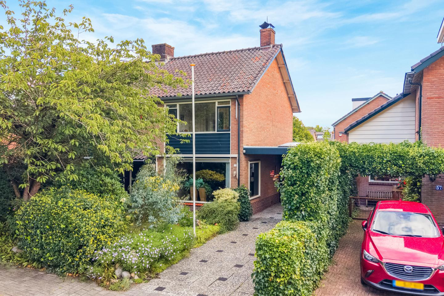 Tussenwoning te koop: van Lyndenlaan 55, Hoevelaken