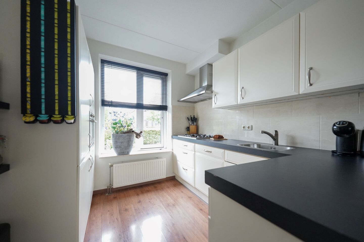 Tussenwoning te koop: Mennestraat 70, Putten