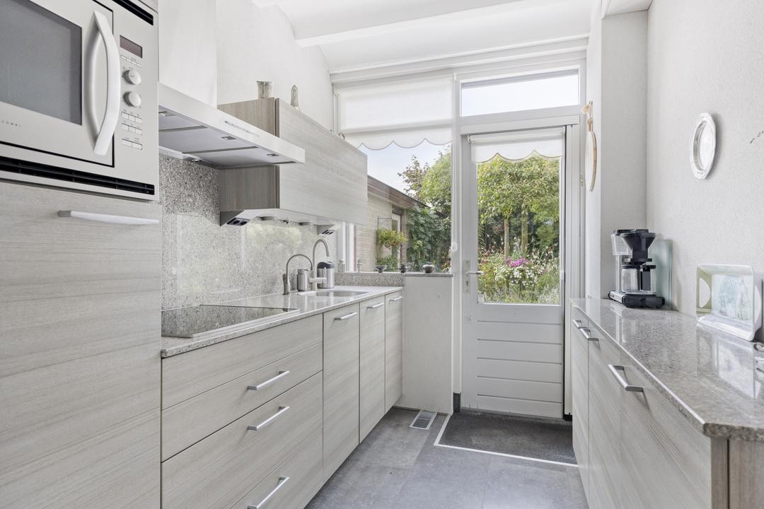 Tussenwoning te koop: Eikenlaan 55, Scherpenzeel