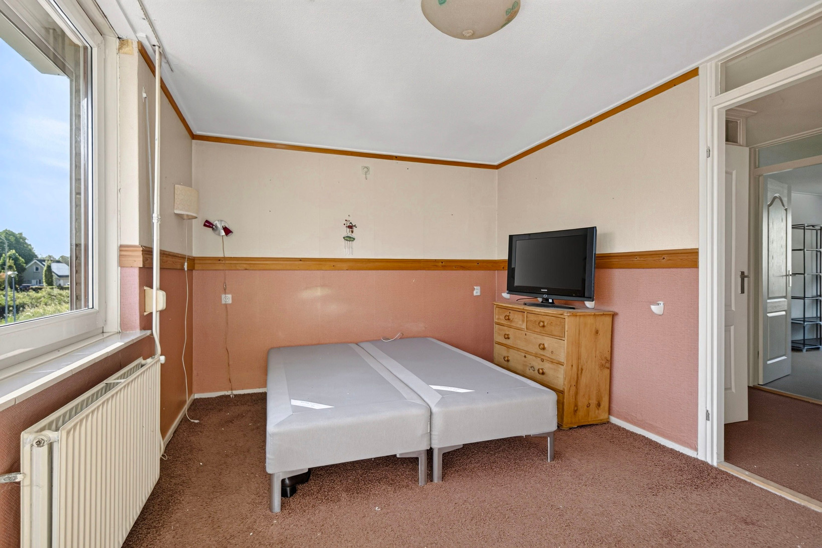 Tussenwoning te koop: Acquoylaan 15, Tiel