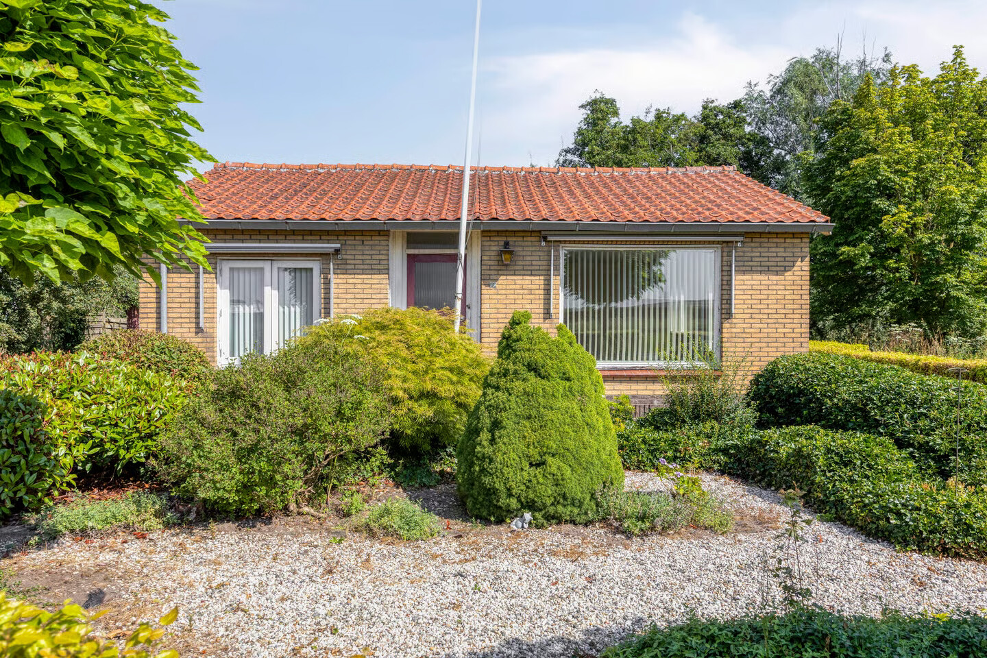 Vrijstaande woning te koop: Stationsweg 28, Wadenoijen