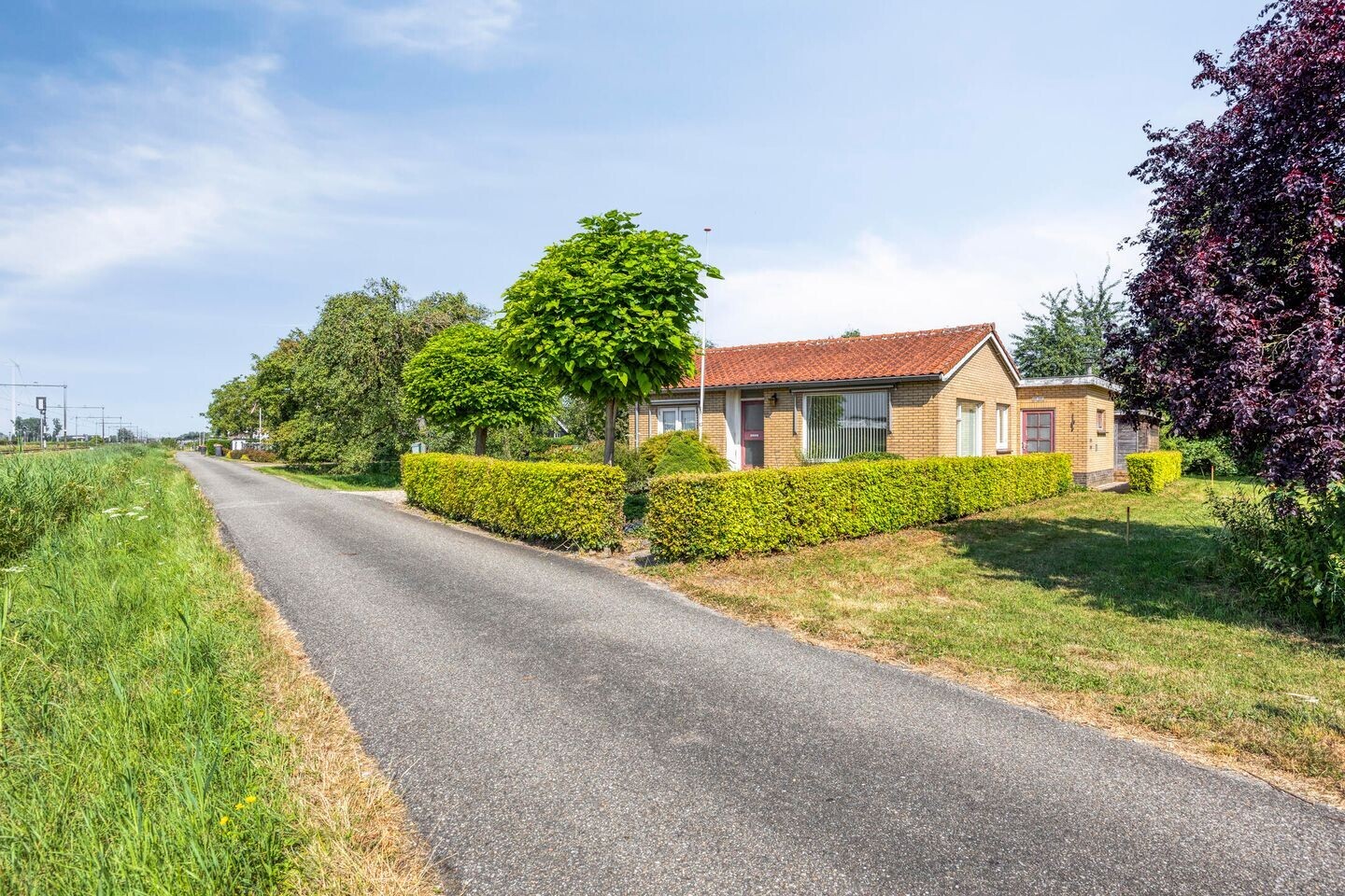 Vrijstaande woning te koop: Stationsweg 28, Wadenoijen