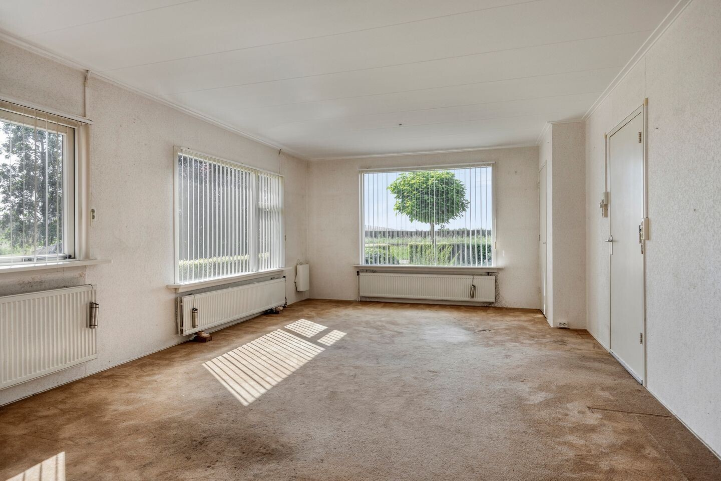 Vrijstaande woning te koop: Stationsweg 28, Wadenoijen