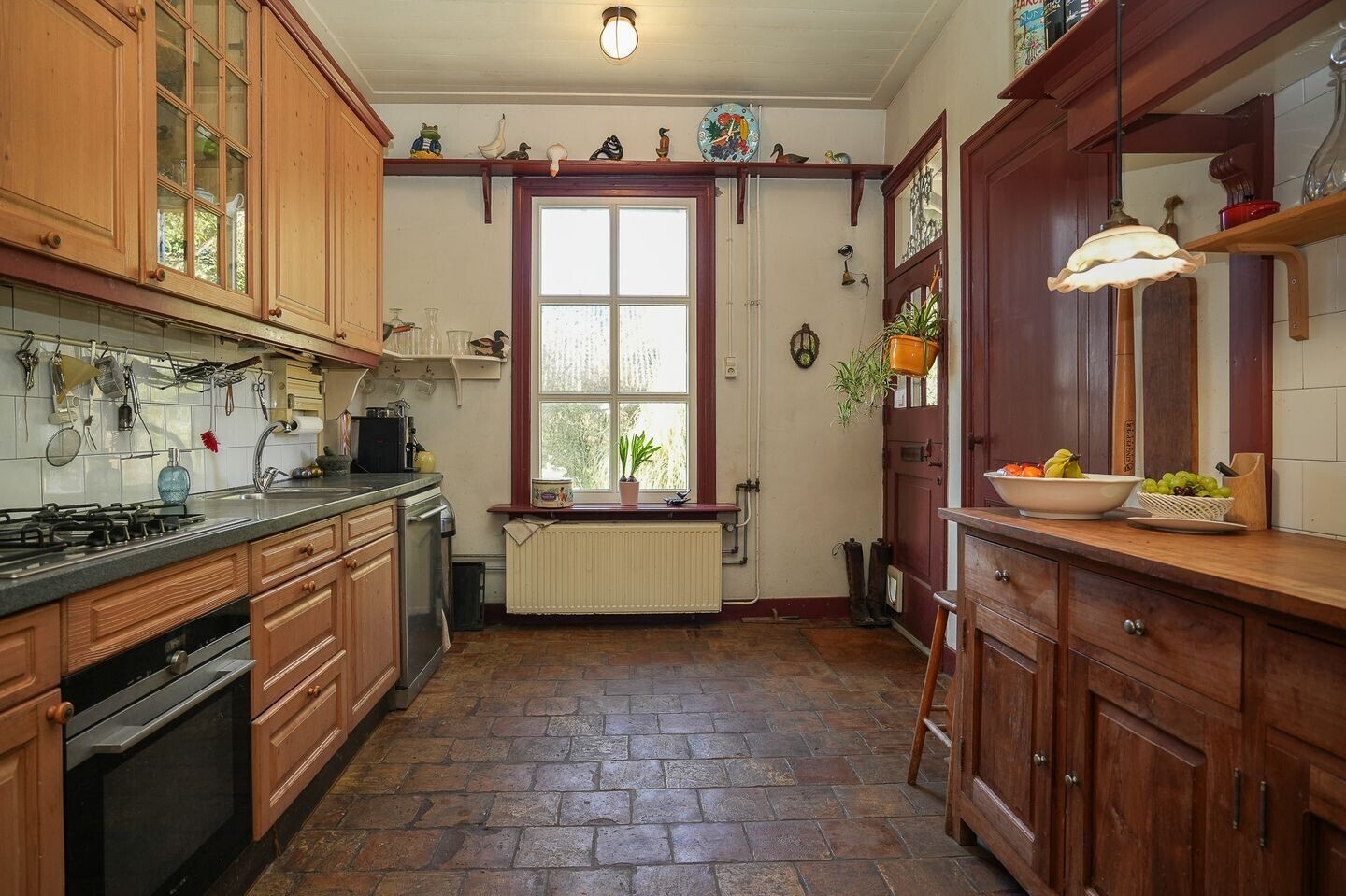 Vrijstaande woning te koop: Bommelweg 1, Wadenoijen