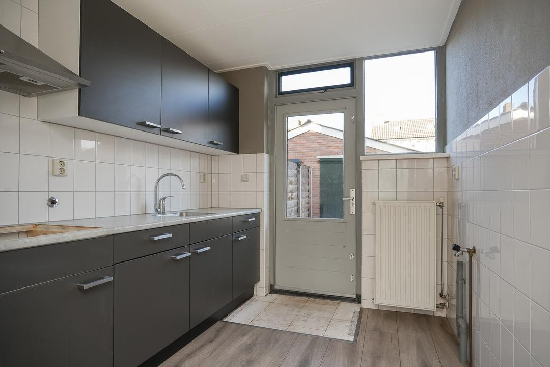 Hoekwoning te koop: Ooievaarstraat 48, Opheusden