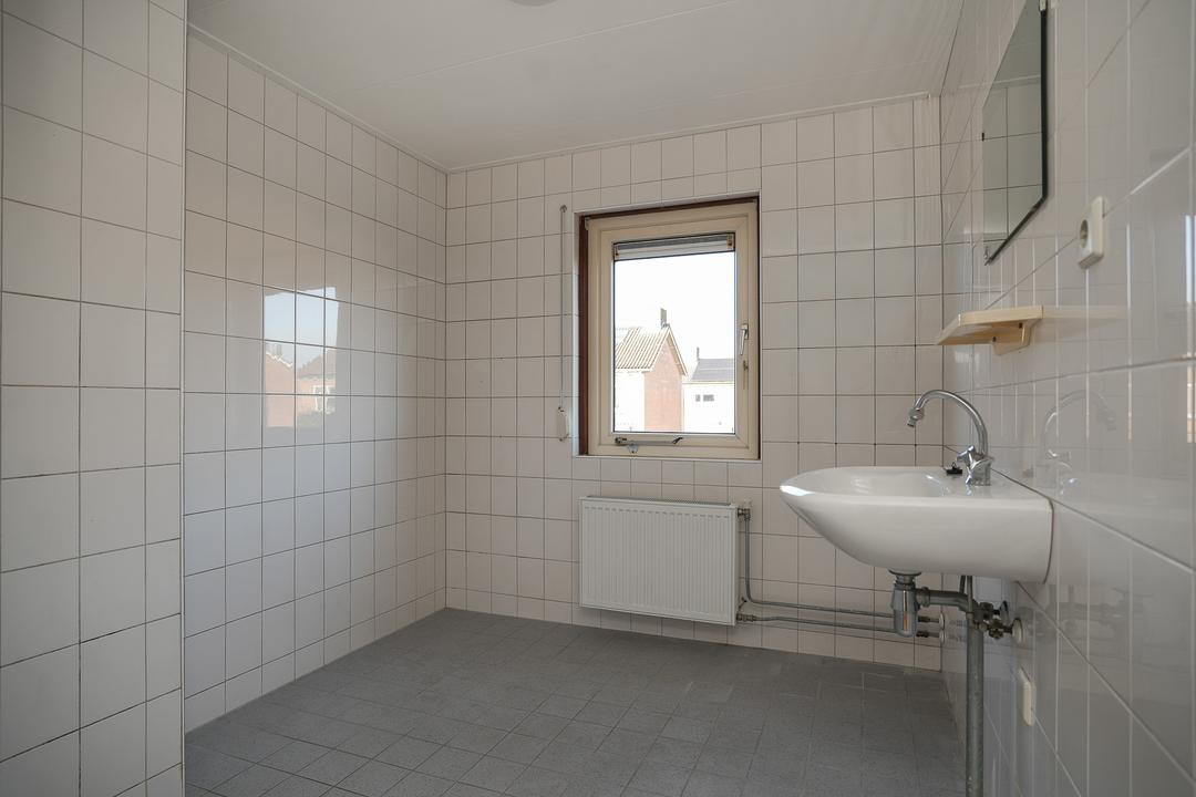 Hoekwoning te koop: Ooievaarstraat 48, Opheusden
