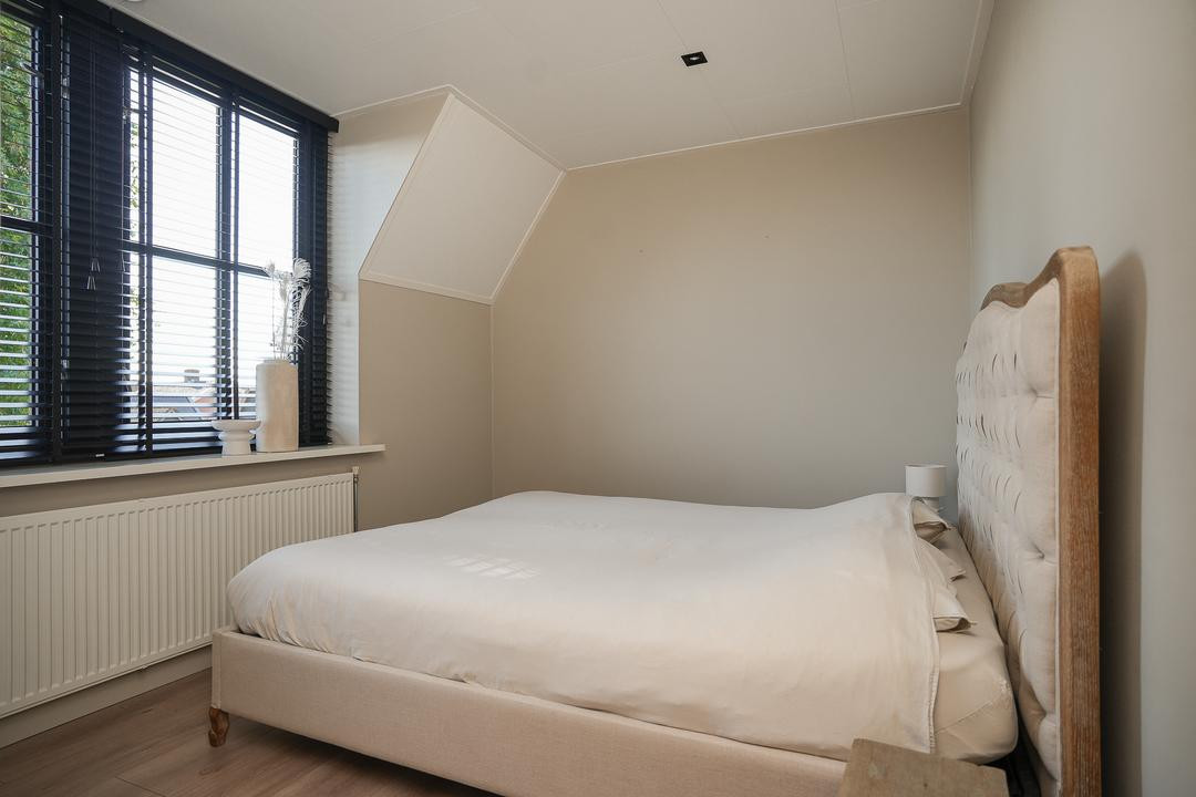 Tussenwoning te koop: Meidoornstraat 20, Opheusden