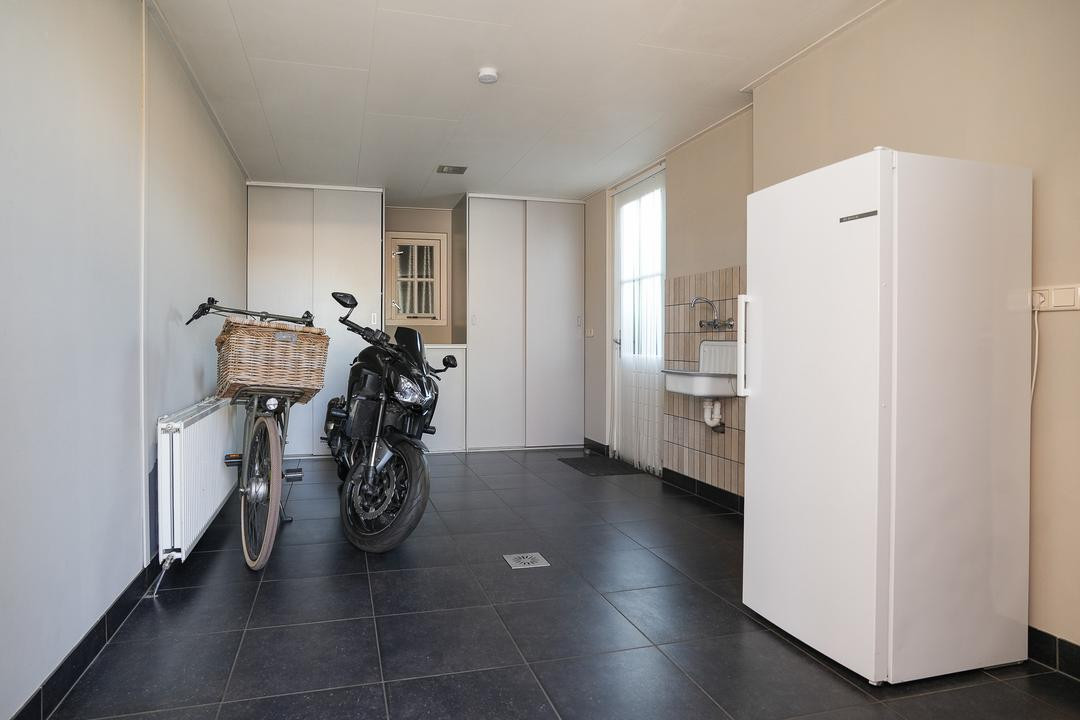 Tussenwoning te koop: Meidoornstraat 20, Opheusden
